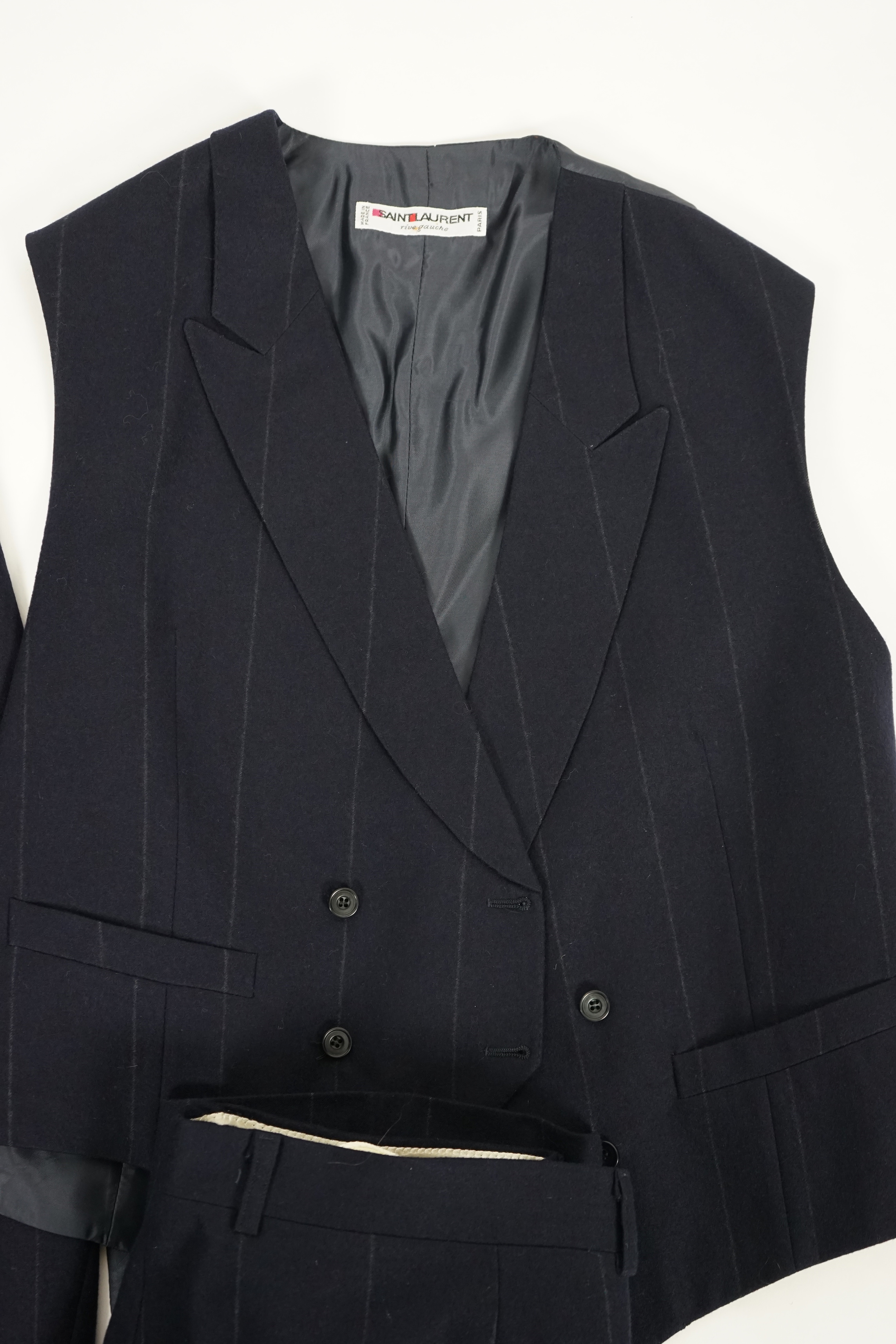 A Saint Laurent rive gauche gentlemen's navy chalk stripe three-piece double breasted wool suit, jacket 42